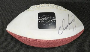 lot 36 image: Autographed 10 years of memory football (Dan Marino #13)