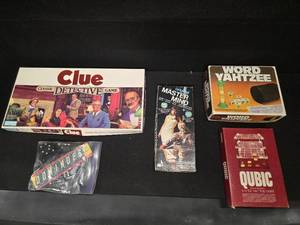 lot 98 image: Vintage Board games, Qubic, Master mind, Clue, Dominoes, & Word Yahtzee