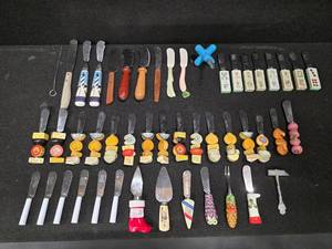 lot 69 image: Collection of 44 Butter Knives and some various similar utensils