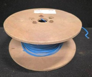 lot 42 image: A 7-lb Spool of 12 AWG CCS Tracer Wire. Single strand copper wire