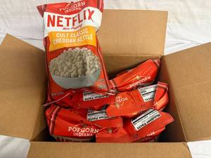lot 176 image: 6 Bags of Netflix Cheddar Kettle Popcorn