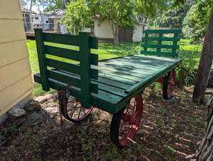 lot 27 image: Vintage Wooden Farm Wagon with Red Iron Wheels