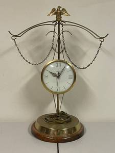 lot 575 image: Vintage United Metal Eagle Mantel Clock with Chains and Roman Numerals