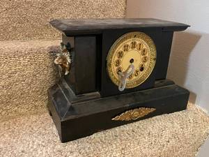 lot 584 image: Antique Black Mantel Clock with Ornate Lion Head Details
