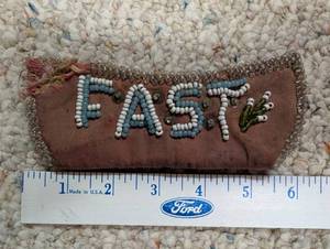 lot 666 image: Vintage Beaded Pouch with FAST BOAT Design