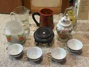 lot 723 image: Collection of Porcelain Tea Cups, Decorative Pitchers, and Oriental Jar