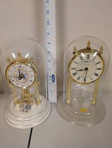 lot 736 image: Set of 2 Glass Dome Anniversary Clocks - Kundo and Howard Miller