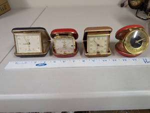 lot 740 image: Set of 4 Vintage Travel Alarm Clocks Elgin and Homestead