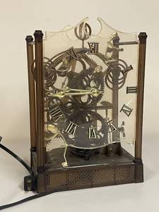 lot 780 image: Vintage Skeleton Clock with Exposed Gears and Roman Numerals
