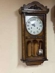 lot 596 image: Vintage Wooden Wall Clock with Pendulum by Sint, 31-Day Wind-Up