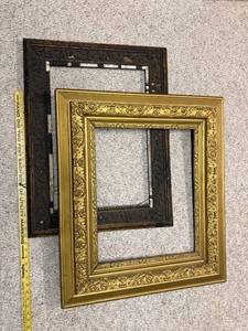 lot 672 image: Pair of Ornate Vintage Picture Frames - Gold and Dark Wood