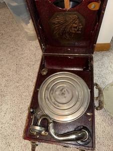 lot 760 image: Antique Portable Phonograph with Native American Motif and Record Collection