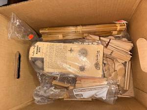 lot 764 image: Basket Weaving Craft Supply Lot with Reeds, Patterns, and Wooden Pieces