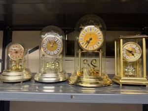 lot 804 image: Collection of 4 Anniversary Mantel Clocks - Quartz Centurion, MYC, and Elgin