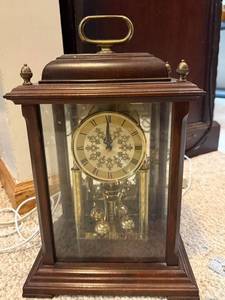 lot 827 image: Mantel Clock with Glass Case and Brass Accents