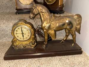 lot 831 image: Vintage United Self Starting Electric Clock with Brass Horse Statue