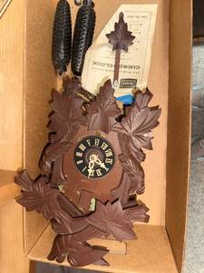 lot 863 image: Vintage Cuckoo Clock with Leaf Design and Weights