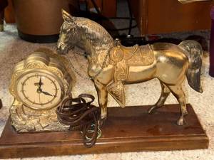 lot 888 image: Vintage United Electric Horse Clock on Wood Base