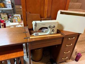 lot 910 image: Viking Husqvarna Sewing Machine with Wood Cabinet and Accessories