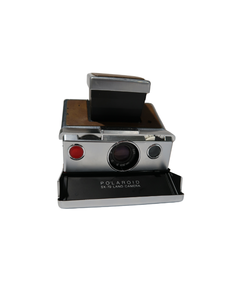 lot 46 image: Vintage Polaroid SX-70 Land Camera with Original Leather Case & Accessory Kit