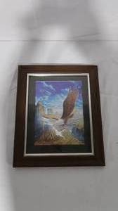 lot 69 image: Framed Textured Print of an Eagle Flying Over a Canyon