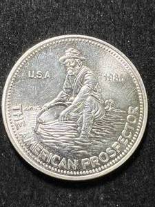 lot 15 image: 1 TROY OZ .999 FINE SILVER 1985 ENGELHARD AMERICAN PROSPECTOR ROUND