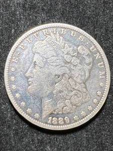 lot 56 image: 1889-O US MORGAN SILVER DOLLAR