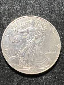 lot 79 image: 1996 AMERICAN SILVER EAGLE 1 TROY OZ .999 FINE SILVER