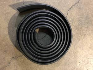 lot 24 image: UT Wire 15 ft. Cord Protector with 3-Channels, Black  Customer Returns See Pictures