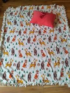 lot 94 image: Animal Themed Tie Blanket & Accent Pillow
