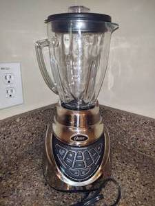 lot 151 image: Oster Glass & Stainless Blender