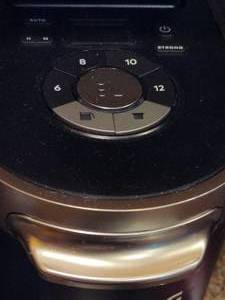 lot 154 image: Keurig Machine, Reusable Cups, Cuisinart Carafe & More