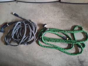 lot 161 image: Two Stretchy Hoses