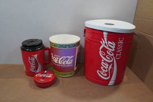 lot 63 image: Coca-Cola Collectibles - Tins, Travel Mug, Garbage Bin