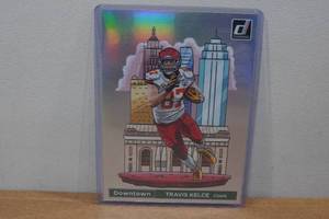 lot 104 image: 2024 Donruss Travis Kelce Downtown Box Topper Football Card