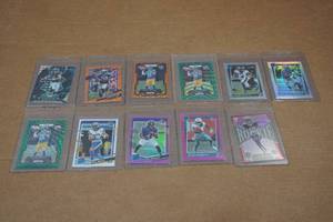 lot 121 image: Football Cards - Vince Young, Amon-Ra St Brown, DeVonta Smith