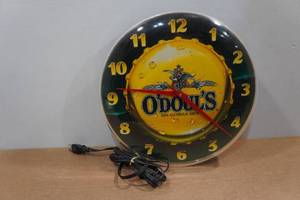 lot 129 image: Vintage ODouls Beer Wall Clock