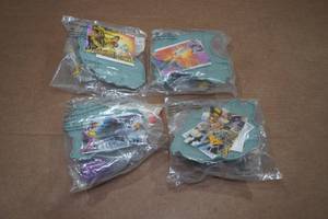 lot 155 image: 4 X-Men Hardees Kids Meal Battle Sets