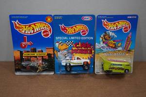 lot 245 image: Hot Wheels Special Edition Promotional Cars - C. Rex, Van de Kamps Bus, Jiffy Lube