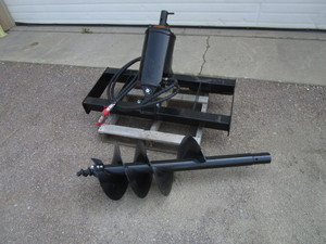 lot 18 image: Mower King Skid Steer 16 Auger