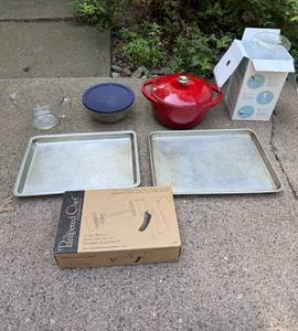 lot 13 image: Kitchen Bakeware and Cookware Collection Including Baking Sheets, Red Dutch Oven, Pyrex, and More