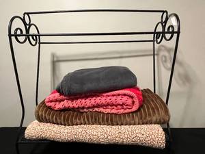 lot 22 image: Metal Blanket Rack with Assorted Blankets