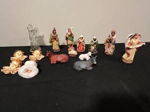 lot 26 image: Nativity Scene Figurine Collection with Angels and Animals
