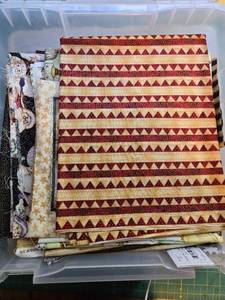 lot 64 image: Collection of Holiday Quilting Fabrics with Santa and Winter Designs