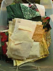 lot 68 image: Large Assortment of Holiday and Floral Print Quilting Fabric Scraps