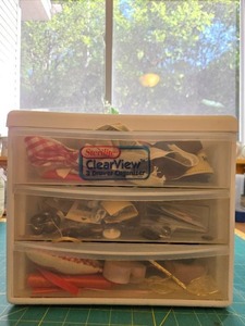 lot 99 image: Sterilite 3-Drawer Organizer with Assorted Sewing Ribbons and Buttons