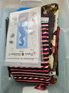 lot 104 image: Christmas Quilting Fabric Pieces and Quilt Patterns Set