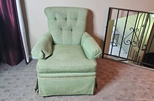 lot 134 image: Upholstered Green Armchair with Skirted Base