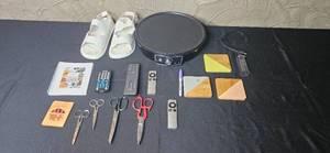 lot 159 image: Household Lot Electric Crepe Maker, Size 9 Sandals, Remotes, Scissors, Coasters, and Accessories
