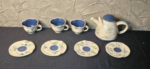 lot 193 image: Handcrafted Pottery Tea Set by Harry Simon with Teapot, 3 Cups, and 4 Saucers